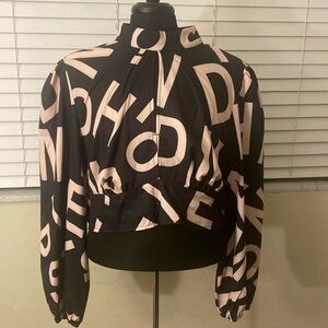 Celure Plus Letter Graphic Cut Out Lantern Sleeve Mock Neck Crop Blouse